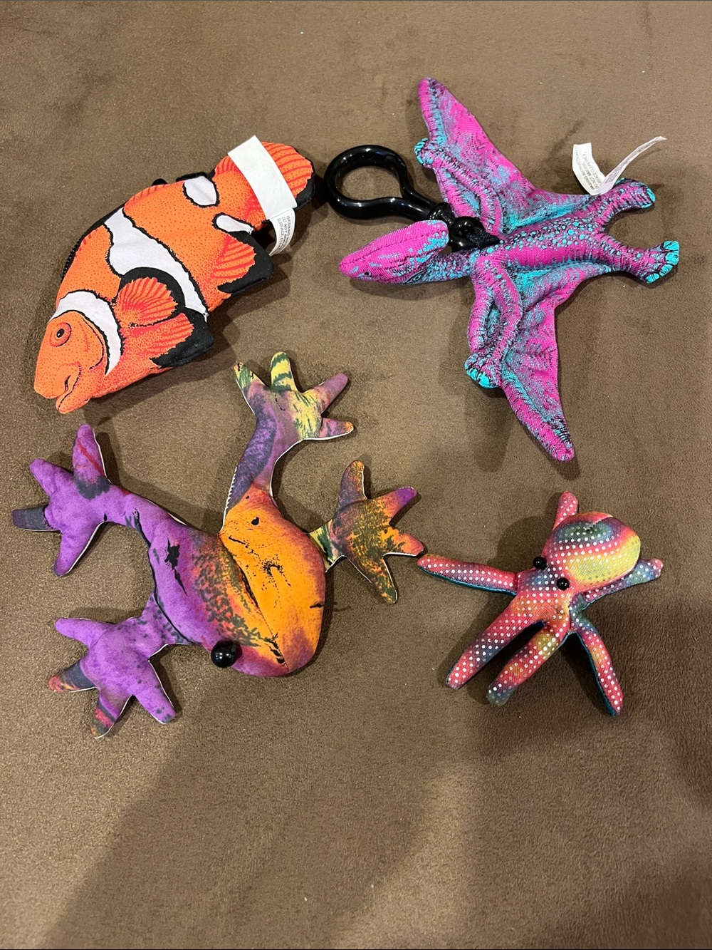 Plush Clownfish coin purse, pterodactyl, weighted frog and mini octopus